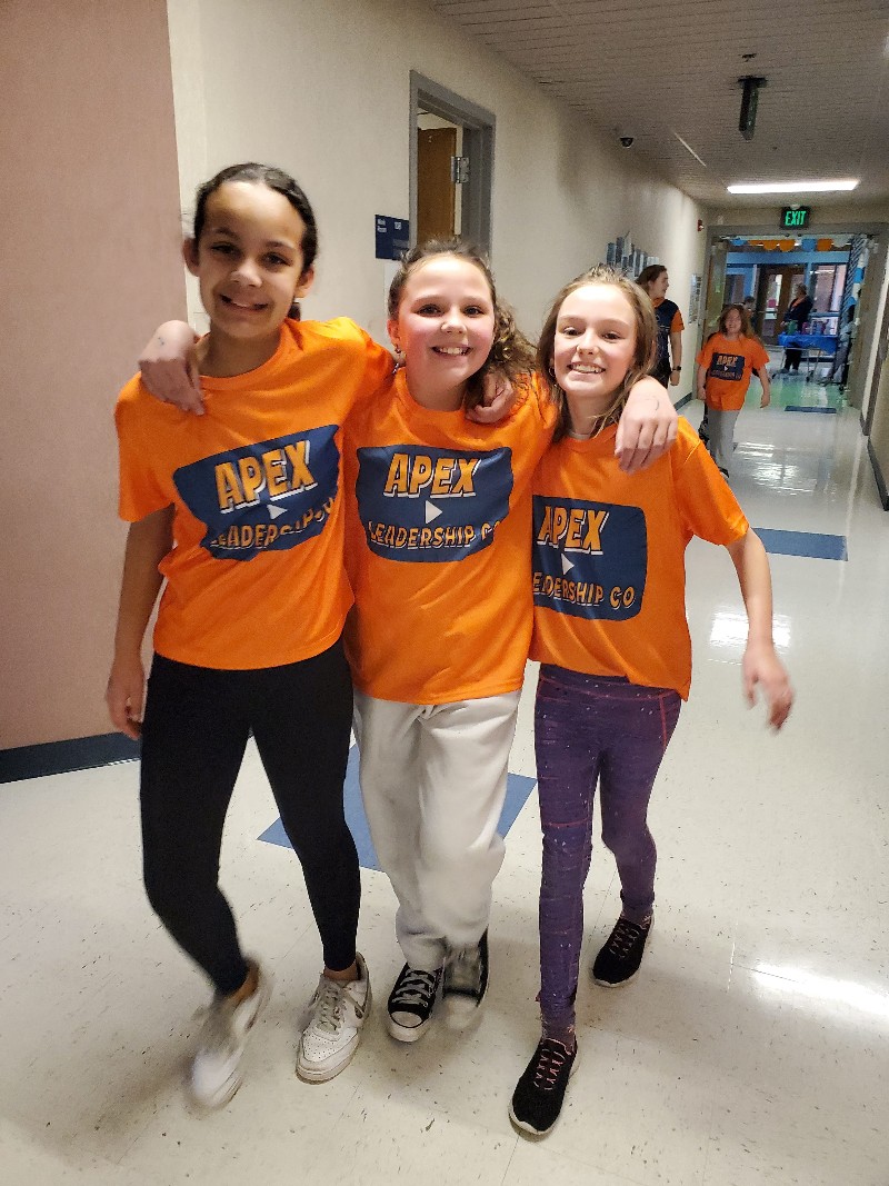 Students walking in a cool down lap at the fun run